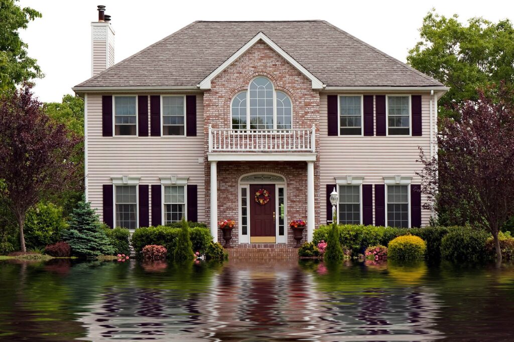 affluent Connecticut home under water resulting from flood