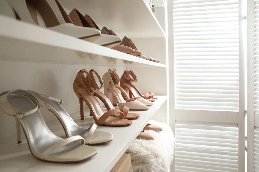 shoe collection in a high end closet
